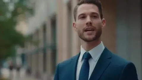 AI Video from prompt: crisp white formal shirt, a navy blue tie, and a