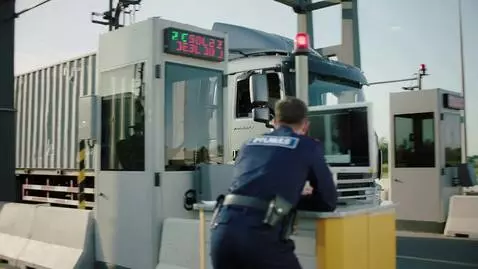 AI Video from prompt: Russian customs checkpoint. A large truck slowly