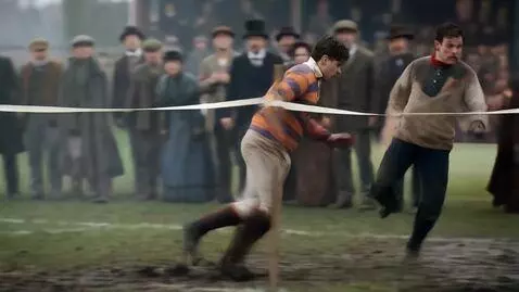 AI Video from prompt: Visual Action: Morton Betts (A.H. Chequer) burst