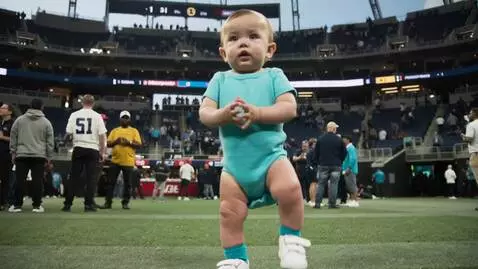 AI Video from prompt: baby dancing "bad bunny" song at the super bowl