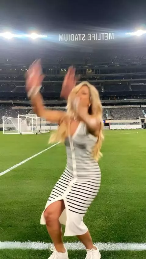 AI Video from prompt: A gymnast in a skirt performs an exercise called