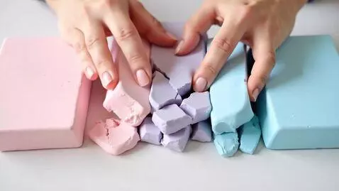 AI Video from prompt: Generate an ASMR crushing video concept where so