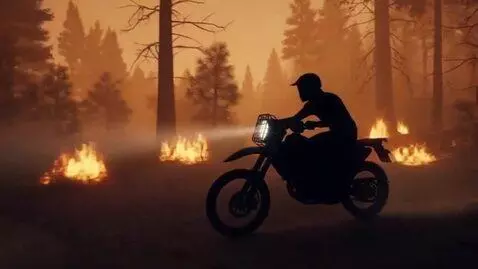 AI Video from prompt: motorcycle speeding in the middle of the wildfir