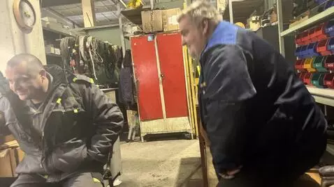 AI Video from prompt: People going to car together in suits