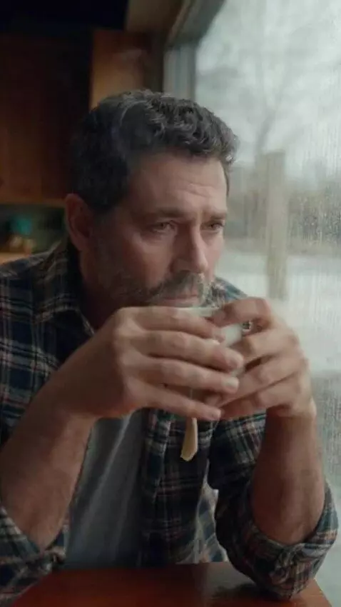 AI Video from prompt: Sad man drink tea and looks to window