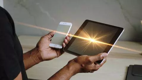 AI Video from prompt: generate a video of an iPhone in a man's hands, 