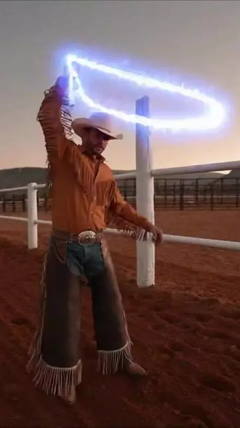 AI Video from prompt: Visuals: A dirt rodeo arena. @stableron is weari