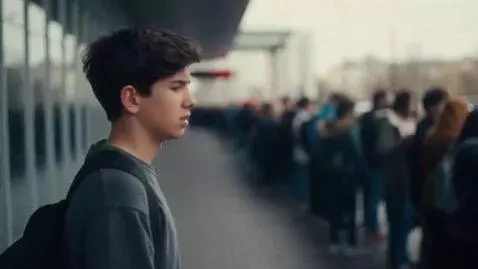 AI Video from prompt: Long waiting line. Loud atmosphere. the boy  THE