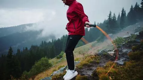 AI Video from prompt: Jumping rope down a mountain in the rain