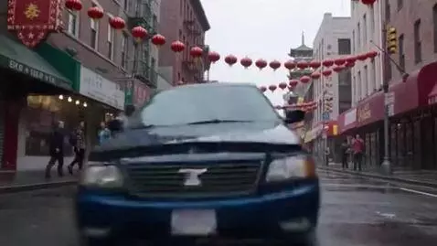 AI Video from prompt: a blue car falls from the sky onto a road in Chi