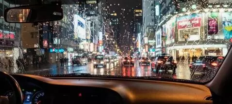 AI Video from prompt: The interior of a car that is driving through th