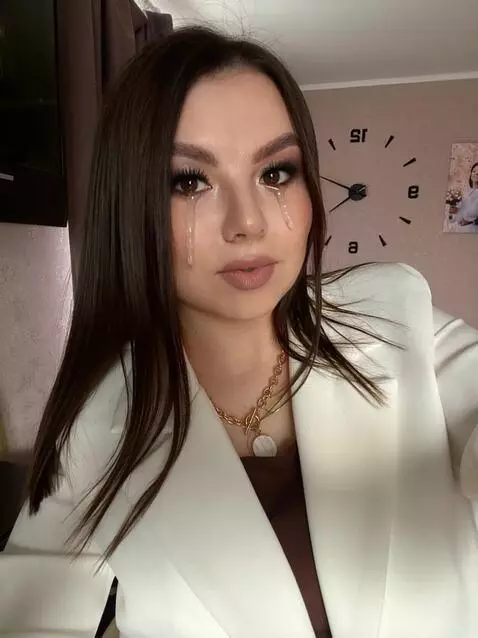 AI Video from prompt: Viscous saliva drips onto the girl's eyelashes a