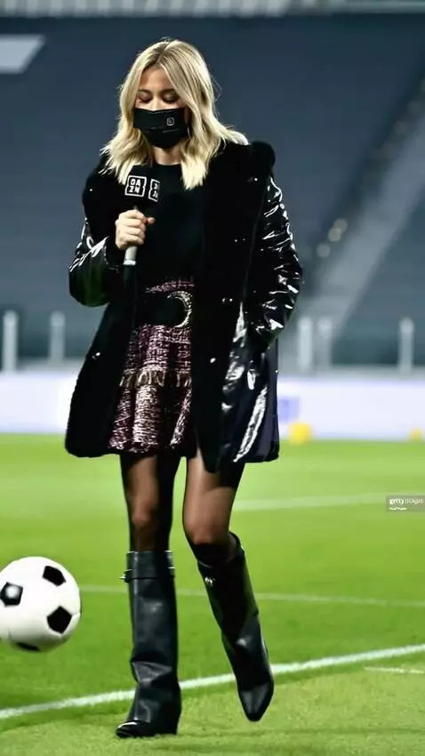 AI Video from prompt: A girl soccer player in skirt  the ball far into