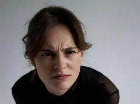 AI Video from prompt: the girl has a slightly displeased look