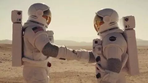 AI Video from prompt: 2 astronauts shaking hands