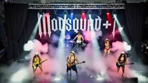 AI Video from prompt: The Letters that spell "MODSQUAD+ 1" starts glow