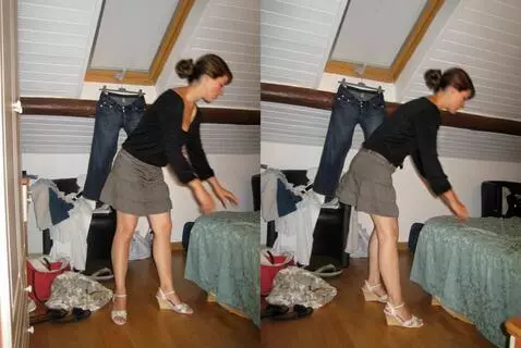 AI Video from prompt: she bends over the bed while keeping her legs st