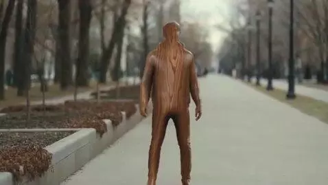 AI Video from prompt: Kolya is walking and suddenly he turns into a ch