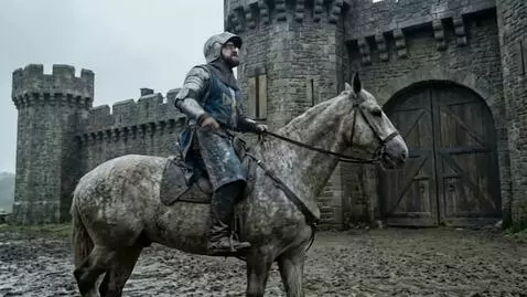 AI Video from prompt: Visual Action: Wide Shot. Beaumanoir, sitting ta