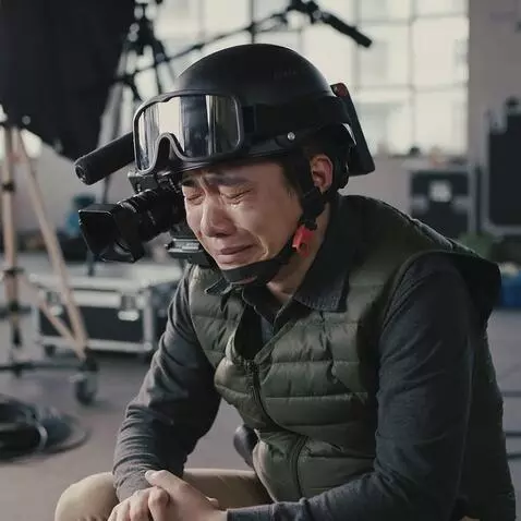 AI Video from prompt: generate a video of a cameraman crying