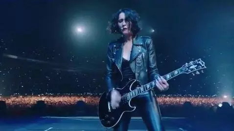 AI Video from prompt: A 25-year-old Italian woman in a full-length roc