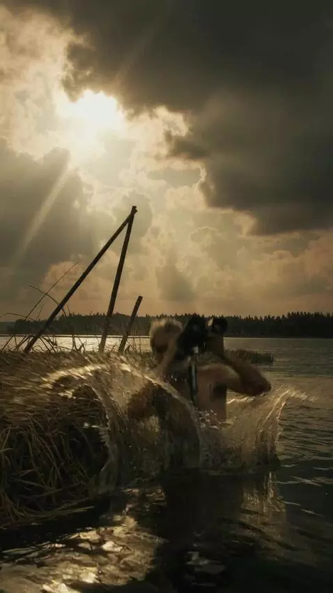 AI Video from prompt: A raft carrying a man in a bathing suit collides