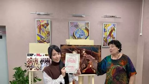 AI Video from prompt: An Asian-looking girl with long hair tied in a p