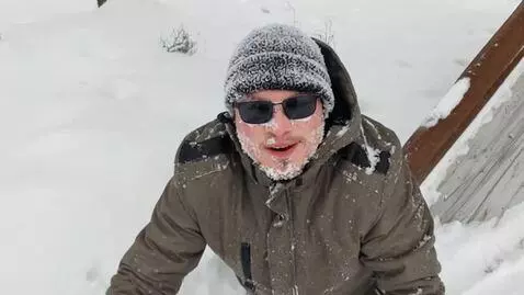 AI Video from prompt: a man eats snow