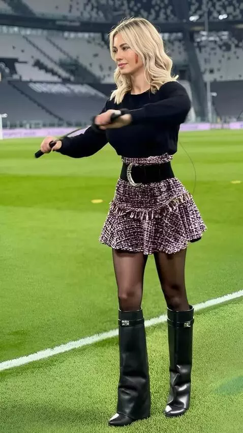 AI Video from prompt: A girl performs a kata with a katana and does a 