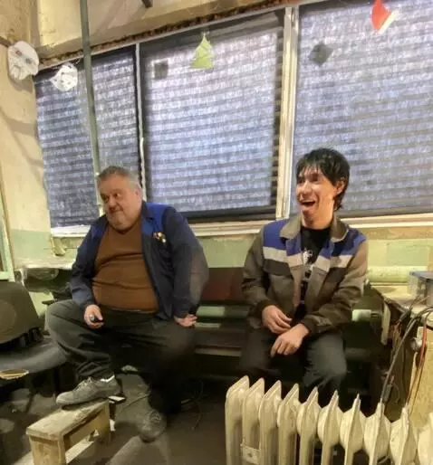 AI Video from prompt: The people in the photo are making faces