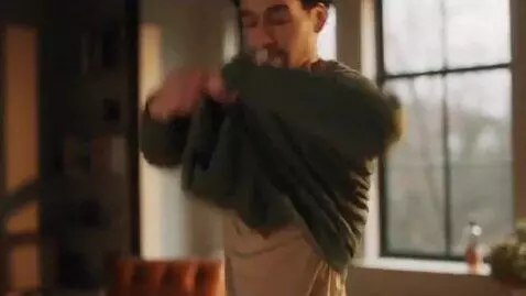 AI Video from prompt: TOOK OFF SWEATER