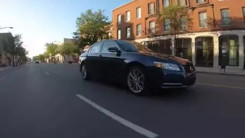 AI Video from prompt: Car goes along the street, sunny weather