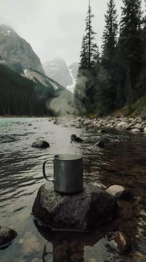 AI Video from prompt: Clear mountain river flowing over rocks, subtle 