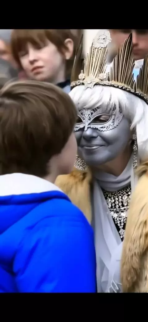 AI Video from prompt: A fifty-year-old snow queen and a young man kiss