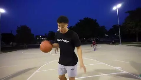 AI Video from prompt: A guy is alone on a basketball court, but he’s a