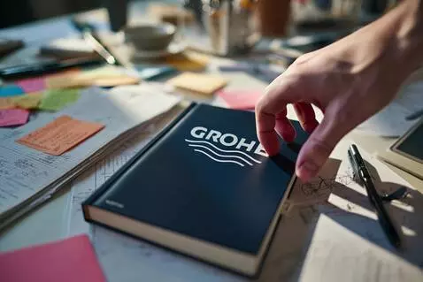 AI Video from prompt: A male hand opening the book. On the first white