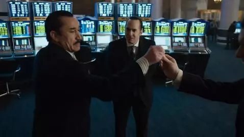 AI Video from prompt: chance flips his coin three times, and then mafi