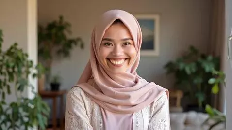 AI Video from prompt: A beautiful Muslim woman in a hijab smiles