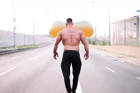 AI Video from prompt: handsome bodybuilder walks down the empty street