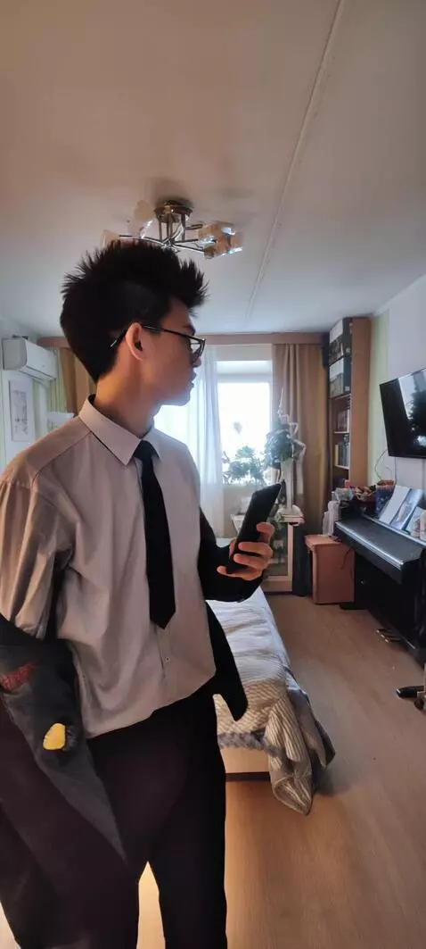 AI Video from prompt: **First photo** The man in this photo is waving 