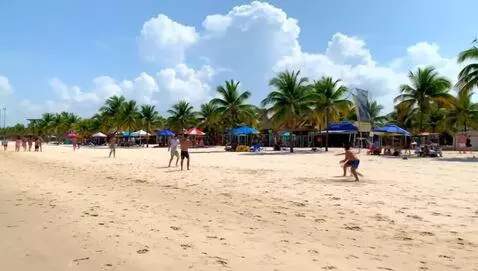 AI Video from prompt: A group of friends sitting on Mahmya beach while