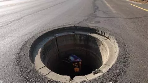 AI Video from prompt: An emergency truck falls into the abyss from a w