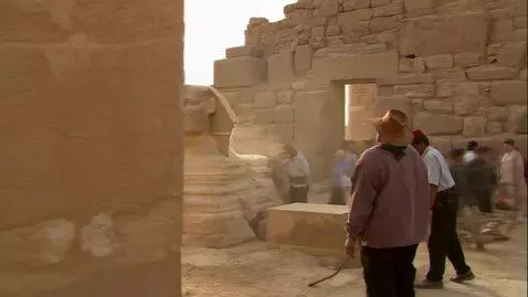 AI Video from prompt: stonemason carving Sphinx from stone, Background