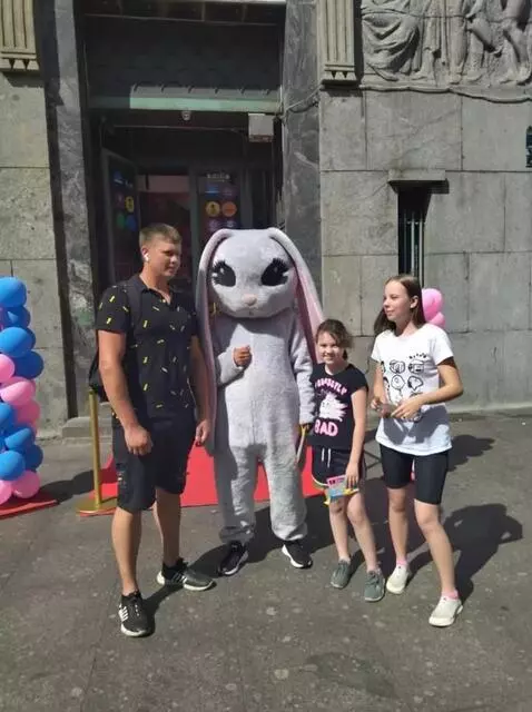 AI Video from prompt: AI video of shy woman posingtakes the rabbit by 