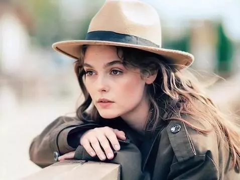 AI Video from prompt: the brooding girl looks at one point. facial exp