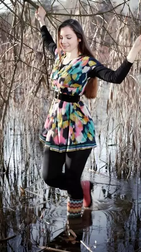 AI Video from prompt: a girl with a spear carefully walks  through the