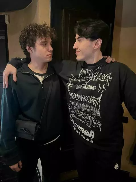 AI Video from prompt: the guys hug