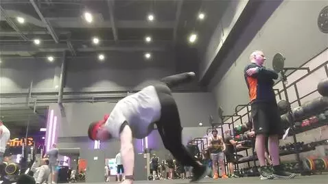 AI Video from prompt: Man started to brakedance in gym