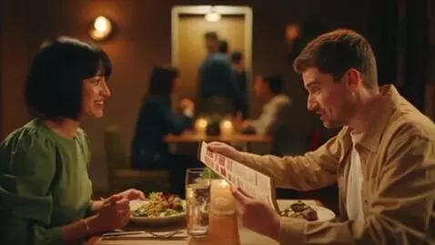 AI Video from prompt: A woman on a first date at a trendy restaurant t