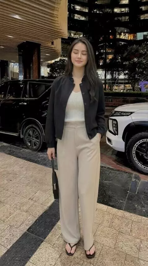 AI Video from prompt: A female model slightly opens her legs to the ri